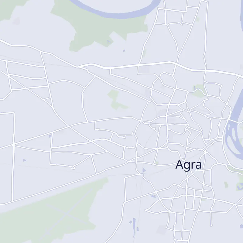 Street map of Agra with 9 numbered pins, one for each clinic in the list.