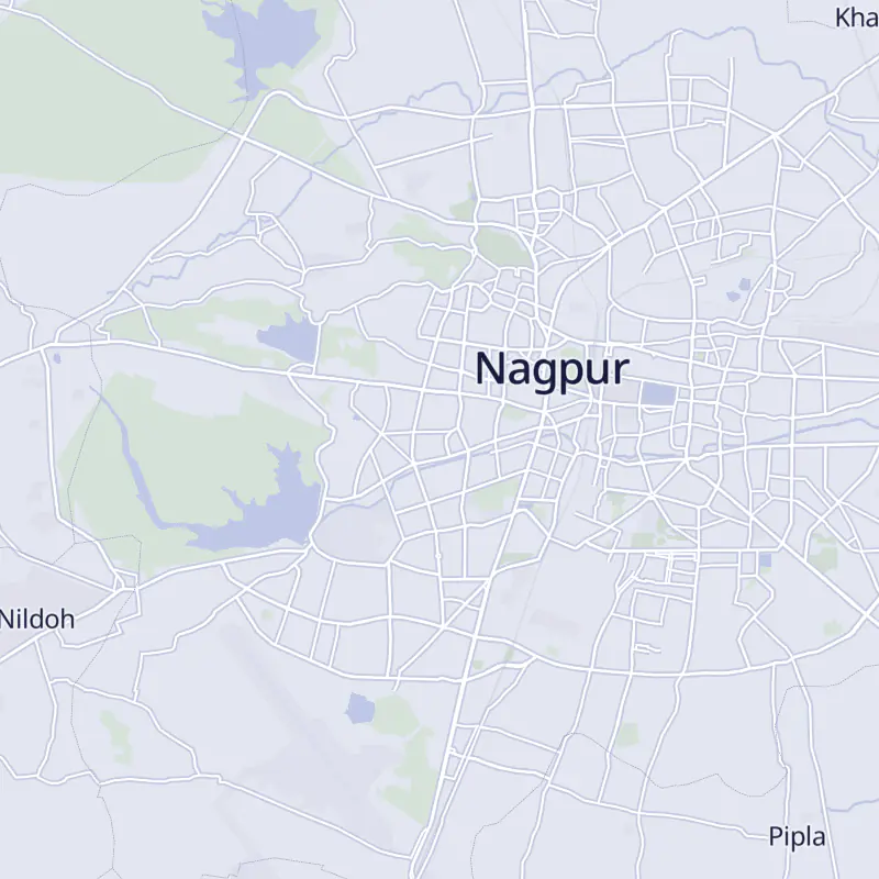 Street map of Nagpur with 14 numbered pins, one for each clinic in the list.
