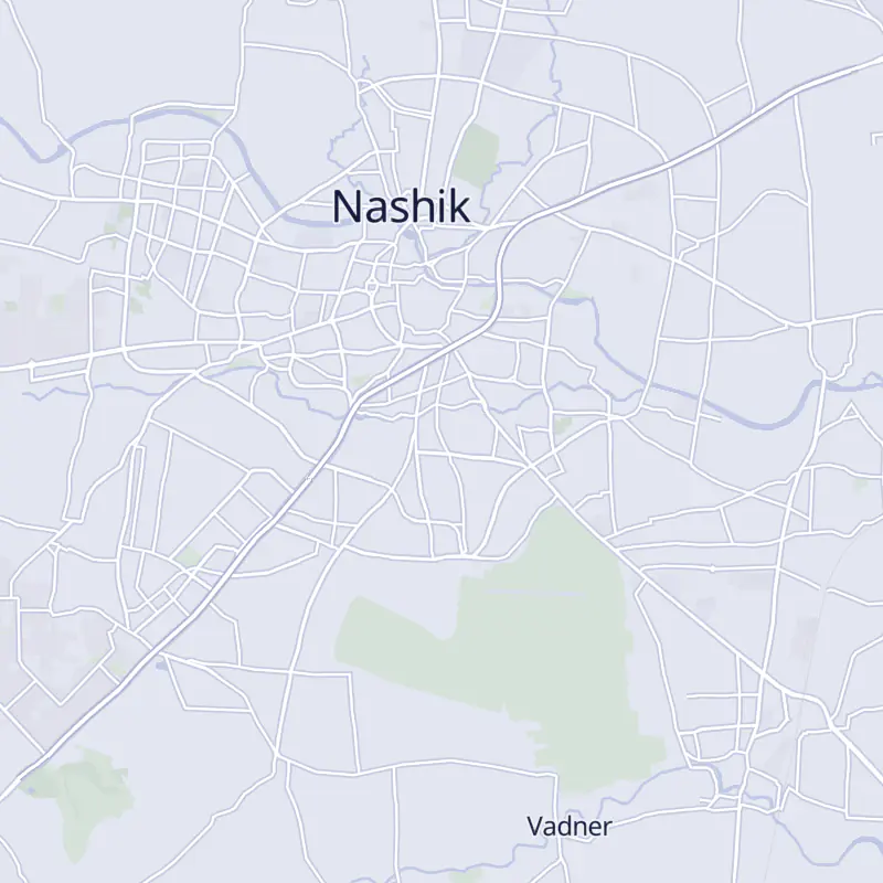 Street map of Nashik with 12 numbered pins, one for each clinic in the list.